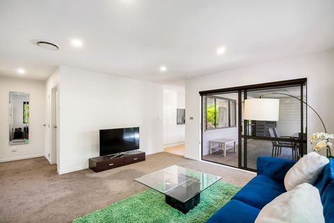 Sit on the couch and watch TV or read a book and relax.