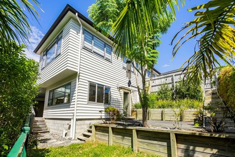 The apartment is located underneath the house.