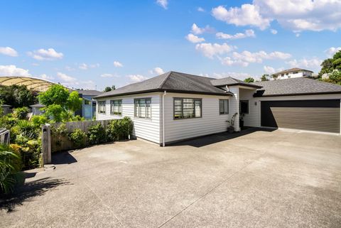 The apartment is underneath this house down the stairs on the left.