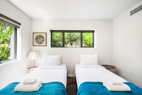 There is lots of natural light in this bedroom.