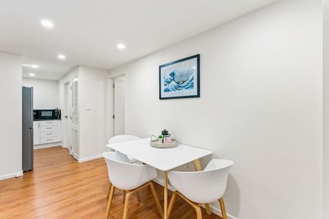 The dining space is in between the lounge and the kitchen.