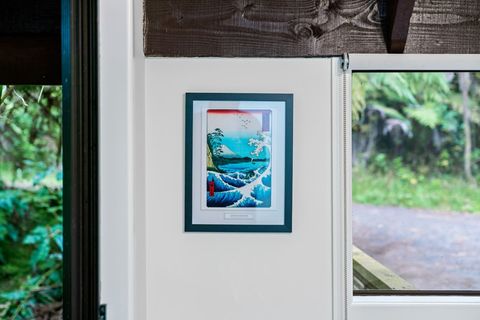 A Japanese wood block print provides a splash of colour.