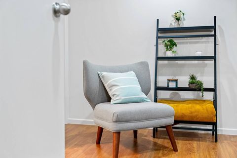 The living room has cute touches that makes it feel like home.