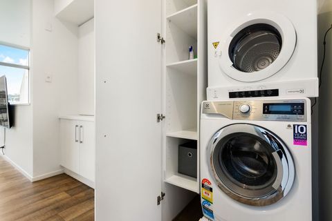 There is a full laundry with front loading washing machine and dryer. There is a complimentary washing powder here for you to use.