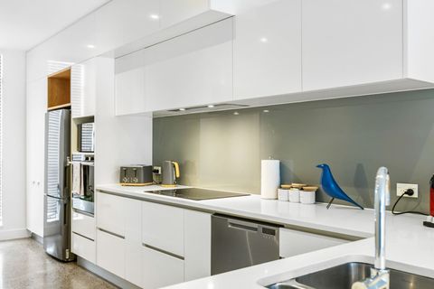 The kitchen has everything you need, including a microwave, oven, cooktop, dishwasher and fridge/freezer.