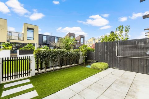 The garden area opens onto a street behind the home.