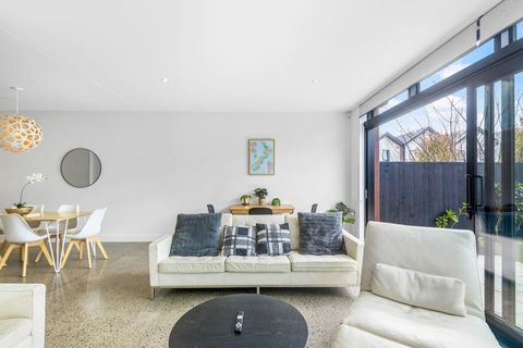 Open-plan living spaces include the lounge, dining area and kitchen.