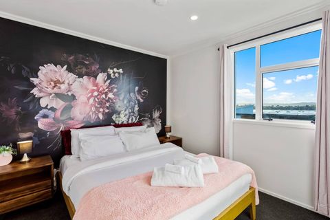 One of the 3 bedrooms with feature walls.