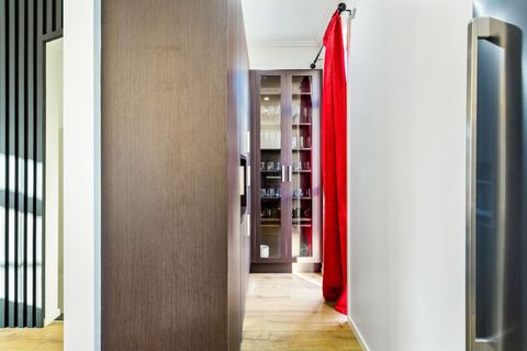 The walk-in wardrobe of the first bedroom.
