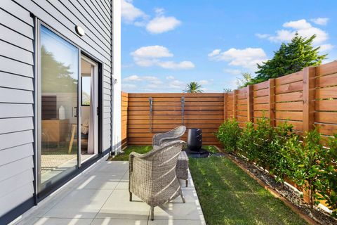 The patio and fold-down clothes line.
