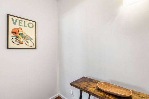Quirky pieces of art add interest to an otherwise bland corner.