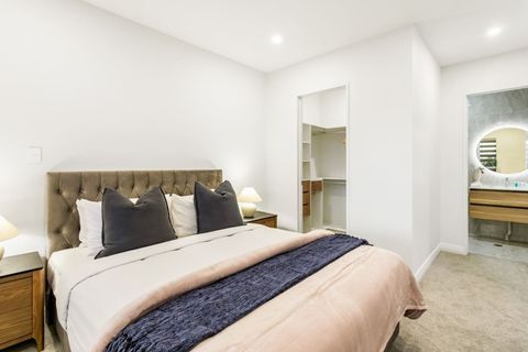 The primary suite has a walk-in wardrobe and ensuite bathroom.
