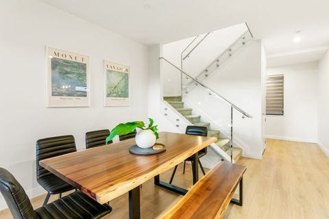 There is a full dining room suite in a part of the open-plan living area.