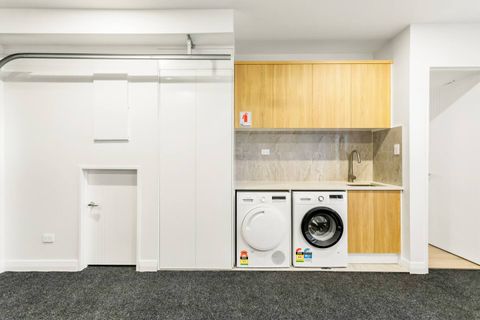 The in-house full laundry comes with a folding bench.
