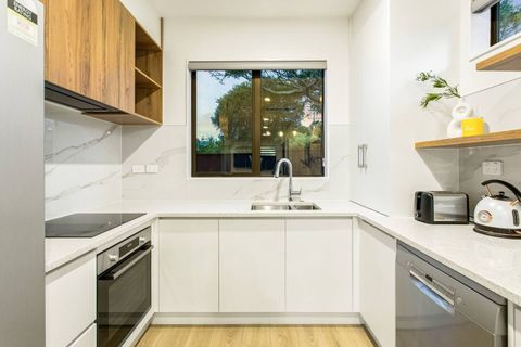 This kitchen has all new appliances and fixtures.
