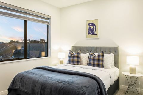 Soft blue furnishings and art decorate this room.