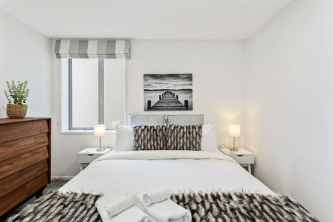 With the black and white accents, this bedroom is a calm, relaxing space.