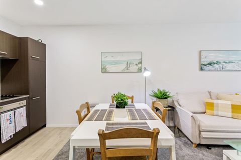 The dining room table can double as a workspace if needed.