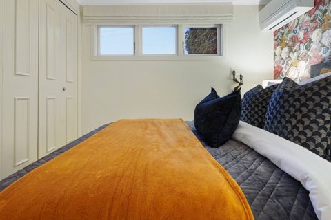 Great storage with large double wardrobes plus natural light from the picture windows.