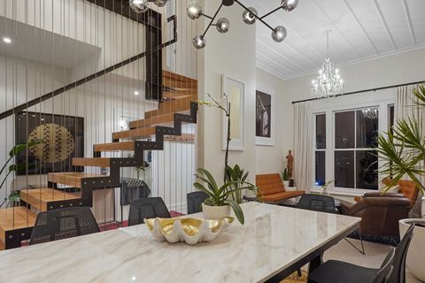 The formal dining table is perfect for the family to sit down for dinner or play games.