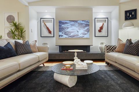 The focal point in the lounge is the gas fireplace and a wall mounted tv that can double as a painting.
