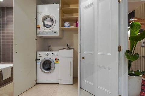 The washing machine and dryer are in a discreet cabinet in the main family bathroom. 
We provide complimentary washing powder for you to use during your stay.