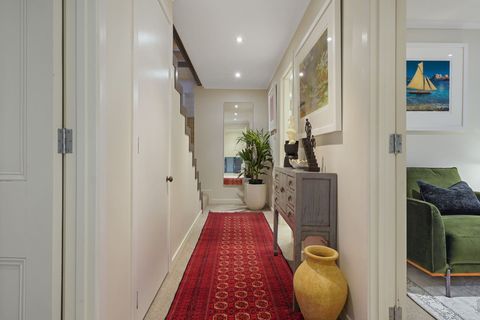 The ground floor hallway to bedroom 3 / 4 and bathroom.