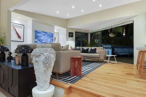 With two comfy couches, the living room invites you to take a seat, and snuggle down on the couch whilst watching Netflix.