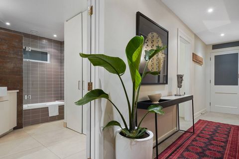 Beside the bedroom 2, is the main family bathroom with bath tub and separate shower.