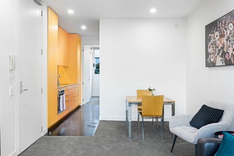 Entry into the apartment is through this door straight into the lounge and dining area.