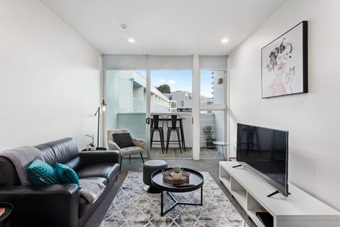 Relaxing lounge area with outside balcony area, allows for extra space.