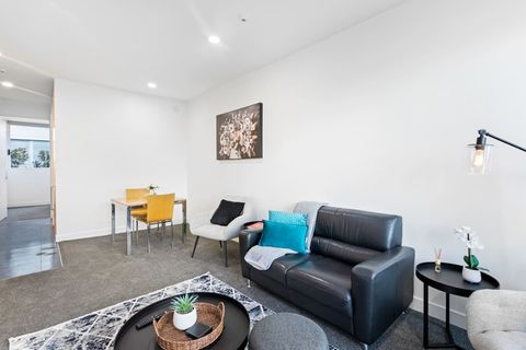 View of the open plan living, dining and kitchen area. Walk through the kitchen to the bedroom and bathroom.