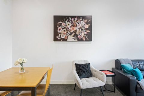 Artwork adorns the walls complimenting the space and colours.