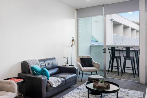 Bar seating on the balcony is a great option to have a few drinks and nibbles.