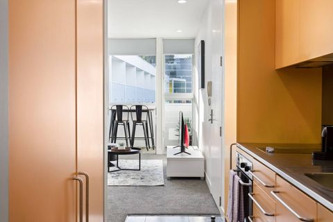 Plenty of storage in this kitchen complete with coffee machine for your morning fix.