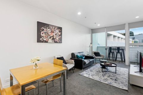 Open plan living with cute dining, lounge and bar seating on the balcony.