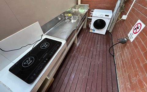 The cooktop is located outside the unit but is undercover - suitable for cooking basic food items.