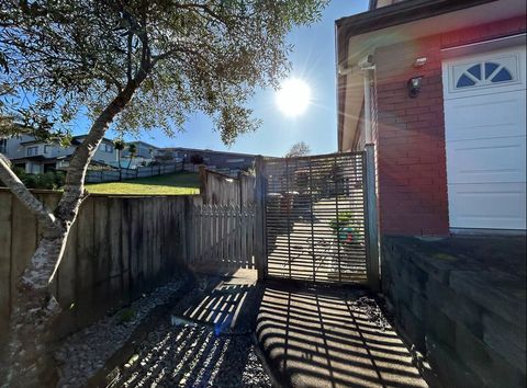 Follow the path around the back of the house to access the apartment.