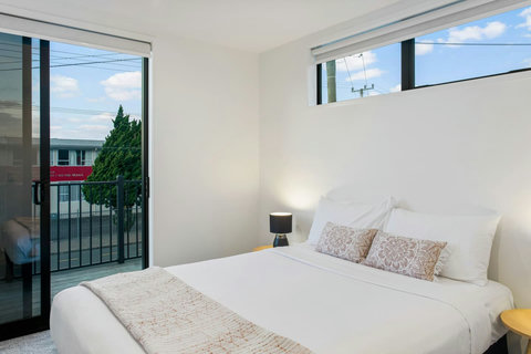 The Queen bedroom has a great ranch slider that can open to allow the breeze through.