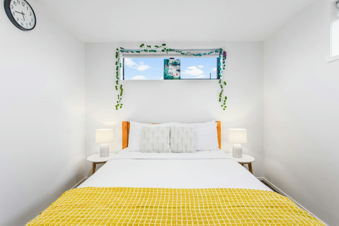 With the pops of yellow, this bedroom is fun and colourful.