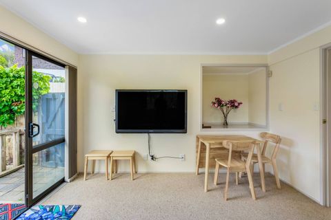 The dining table can be extended and fit another two people on the matching stools.