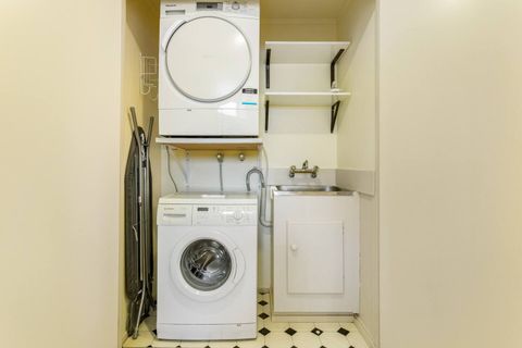The laundry has all of your washing needs covered, with a dryer and washing machine.