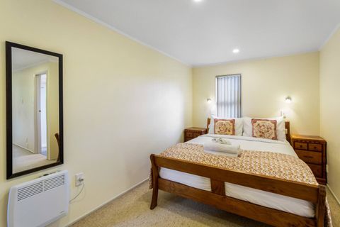 The bedroom also features a mirror and heater for warmth.