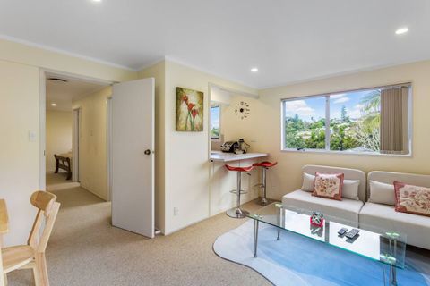 The open-plan living area leads into the kitchen but features a door in the hallway, separating the bedroom from the lounge.