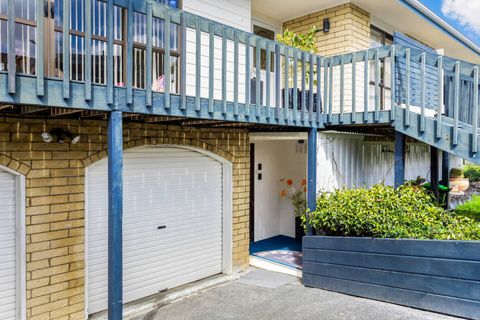 Access to the unit is just to the side of the garage.