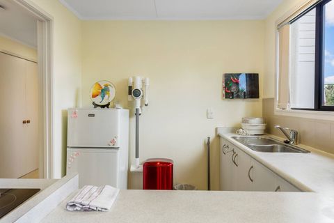 The kitchen area is well-equipped with all of your cooking needs.