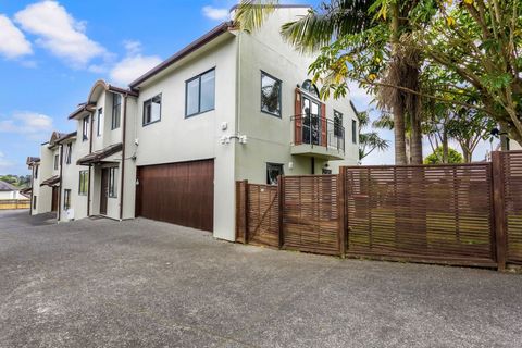 The unit is part of a block of townhouses and is located on the upper level. Garage in the photo is for the unit downstairs.