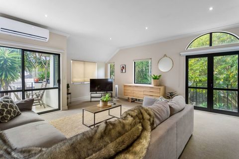 The lounge has indoor/outdoor flow through the ranch slider onto the balcony.