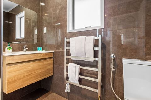 The house has a full-sized bathroom with shower, toilet and vanity unit.