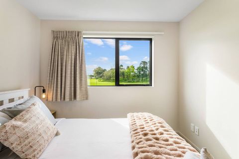 Main bedroom has plenty of natural light but also blinds that can block out the light.